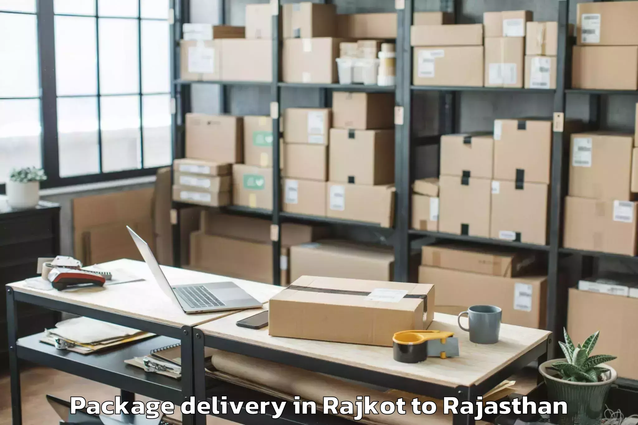 Professional Rajkot to Madhav University Pindwara Package Delivery